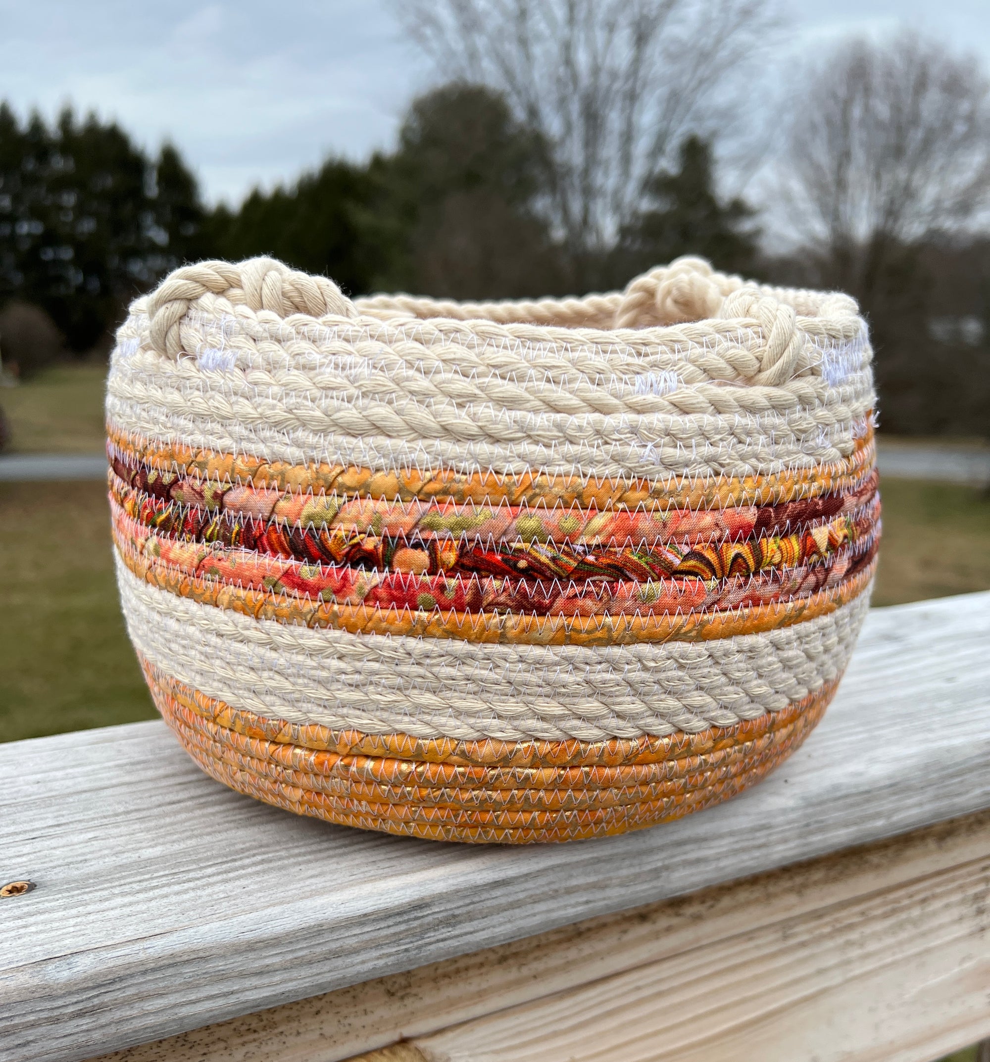 Hanging Planter Light Orange with Gold Accents Coiled Rope Basket